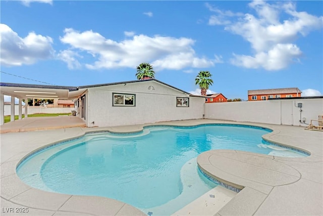 view of swimming pool featuring a patio area, a fenced in pool, and a fenced backyard