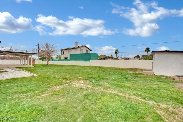 view of yard featuring fence