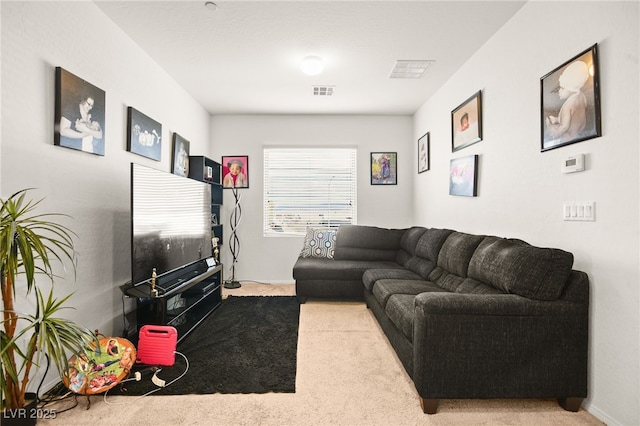 living room featuring visible vents and carpet