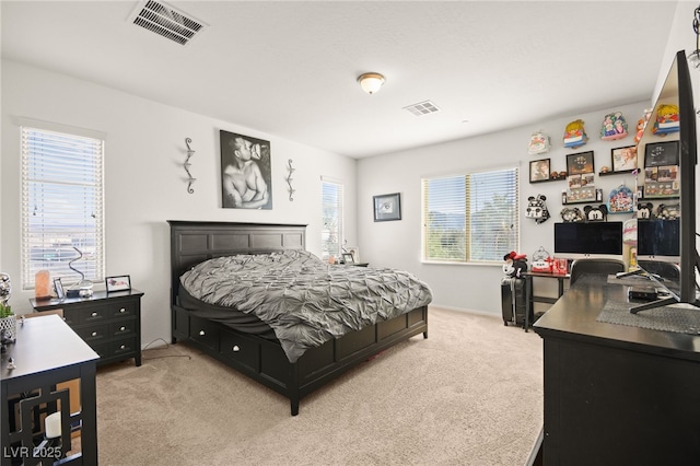 bedroom featuring carpet and visible vents