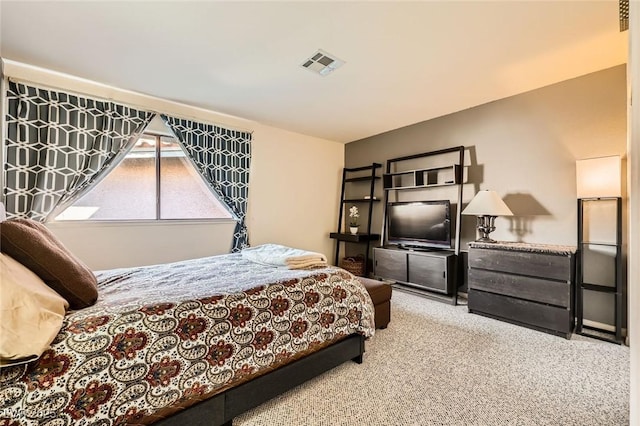 bedroom featuring visible vents and carpet floors