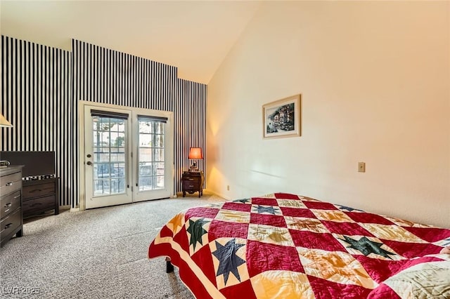 carpeted bedroom featuring access to outside and high vaulted ceiling