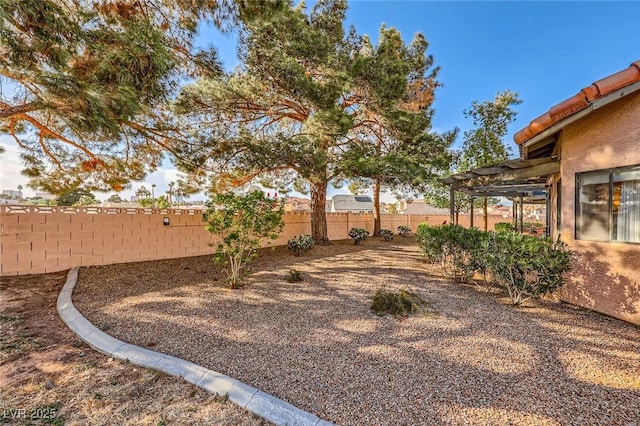 view of yard featuring a fenced backyard