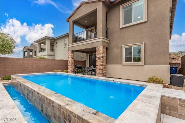 view of pool with a fenced in pool, a patio, and a fenced backyard