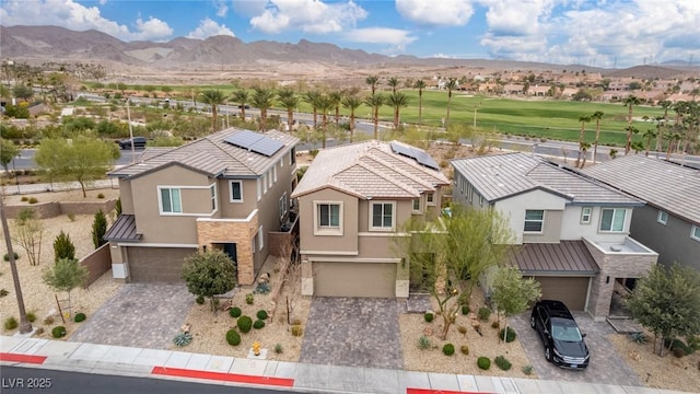 aerial view featuring a mountain view and a residential view