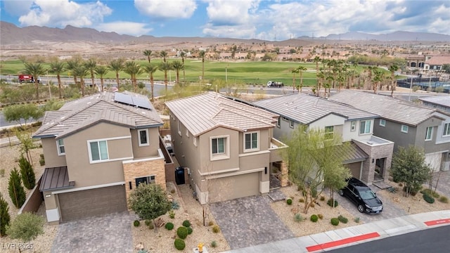 birds eye view of property with a residential view and a mountain view