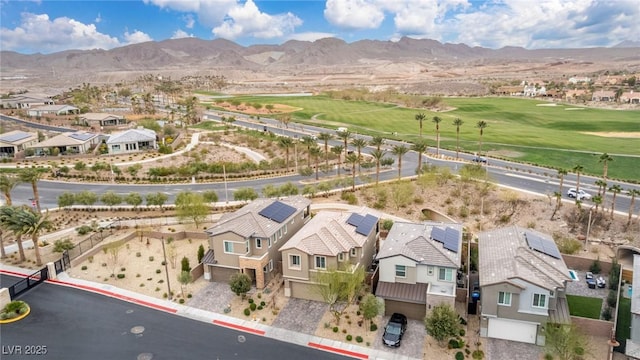 aerial view with a mountain view and a residential view