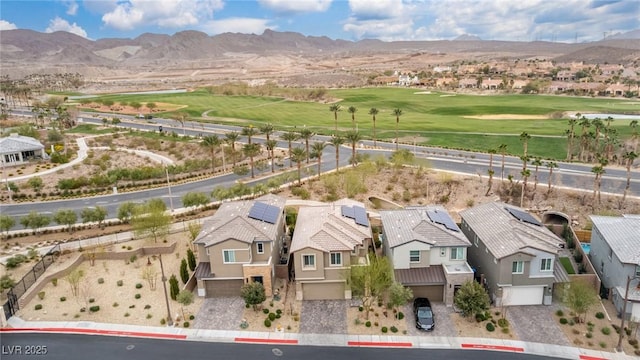 birds eye view of property featuring a mountain view, golf course view, and a residential view