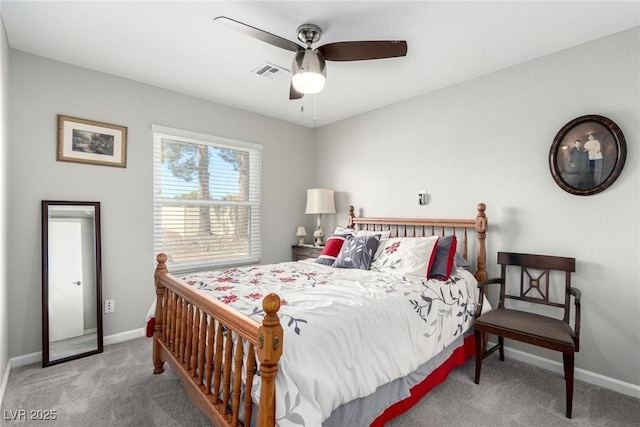 bedroom featuring visible vents, carpet floors, baseboards, and a ceiling fan