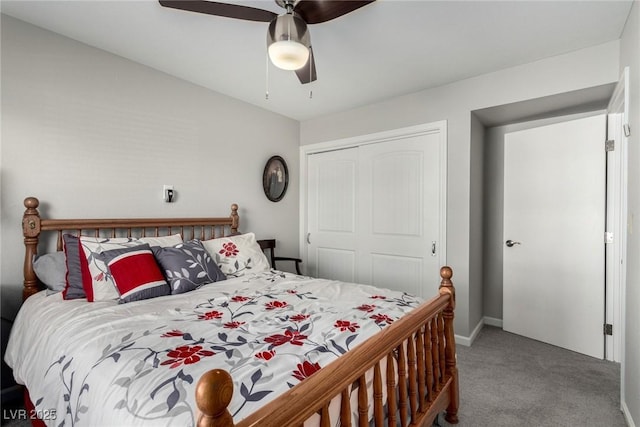 bedroom with a closet, carpet, and ceiling fan