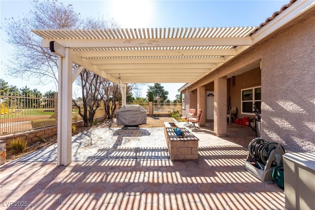 view of patio / terrace featuring a grill, a pergola, and a fenced backyard