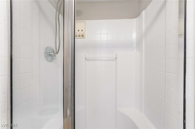 full bathroom with a stall shower