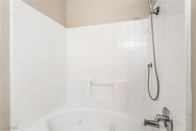 full bathroom featuring a combined bath / shower with jetted tub