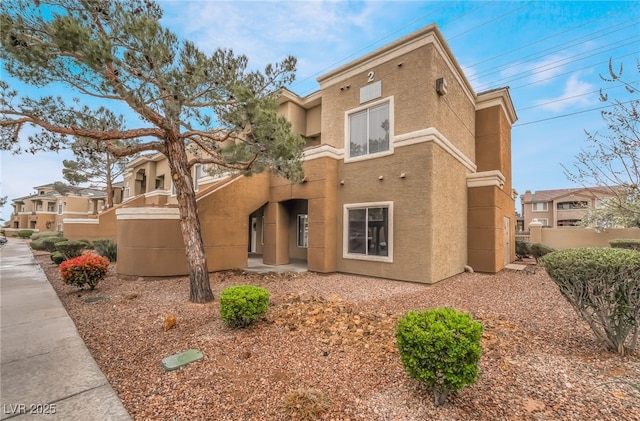 exterior space featuring stucco siding