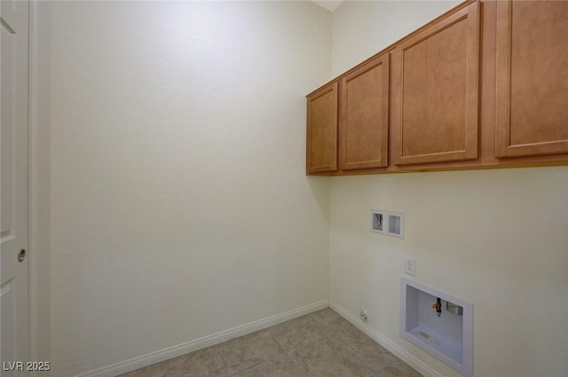 laundry area featuring cabinet space, hookup for a washing machine, baseboards, and hookup for a gas dryer