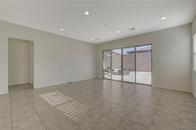 unfurnished room with light tile patterned floors, recessed lighting, visible vents, and baseboards