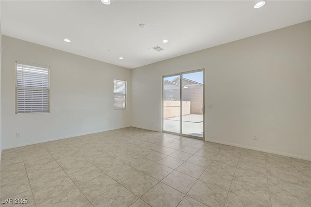 unfurnished room with light tile patterned floors, visible vents, recessed lighting, and baseboards