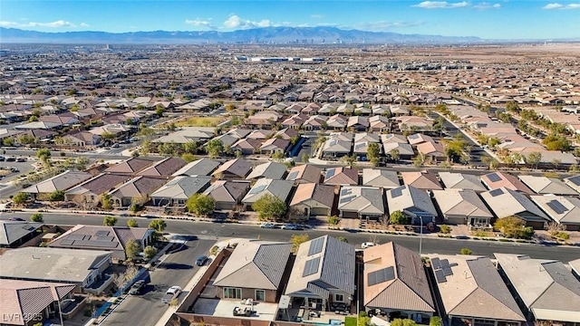 drone / aerial view featuring a mountain view and a residential view