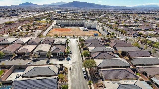 aerial view with a mountain view and a residential view