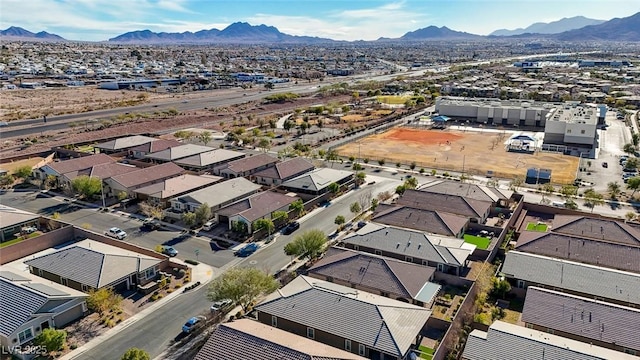 drone / aerial view featuring a mountain view and a residential view