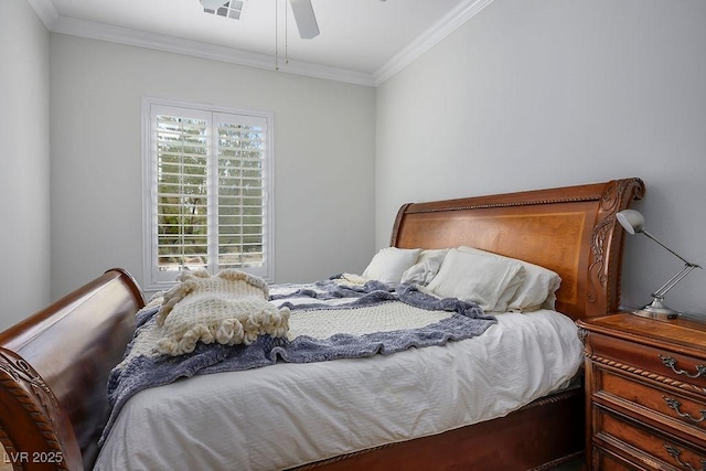 bedroom featuring ceiling fan and ornamental molding