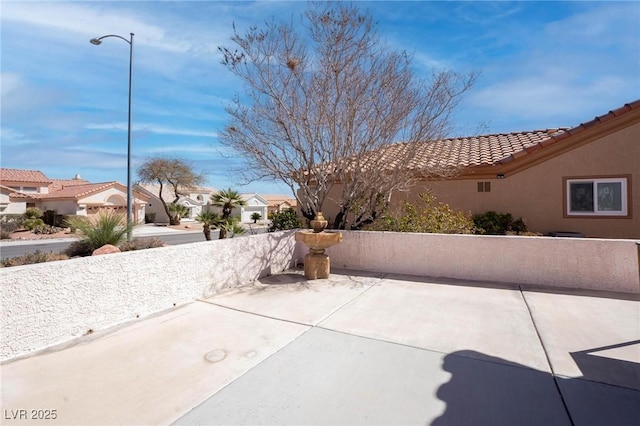 view of patio featuring a residential view