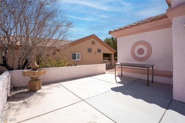 view of patio / terrace with fence