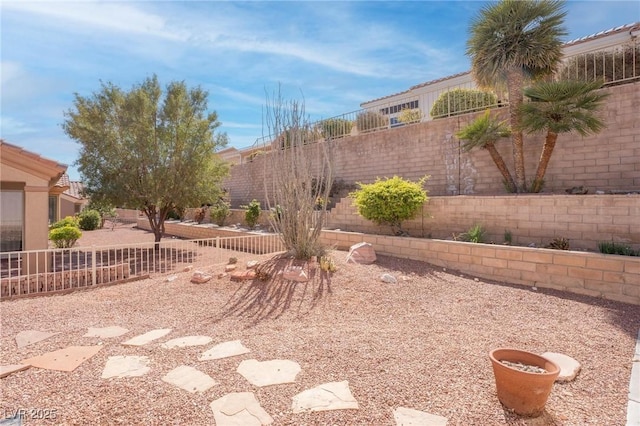 view of yard with a fenced backyard