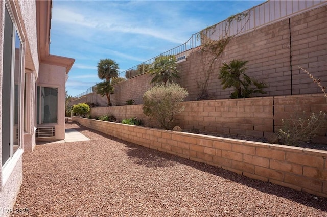 view of yard featuring a patio and a fenced backyard