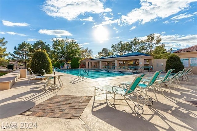 pool featuring a patio area