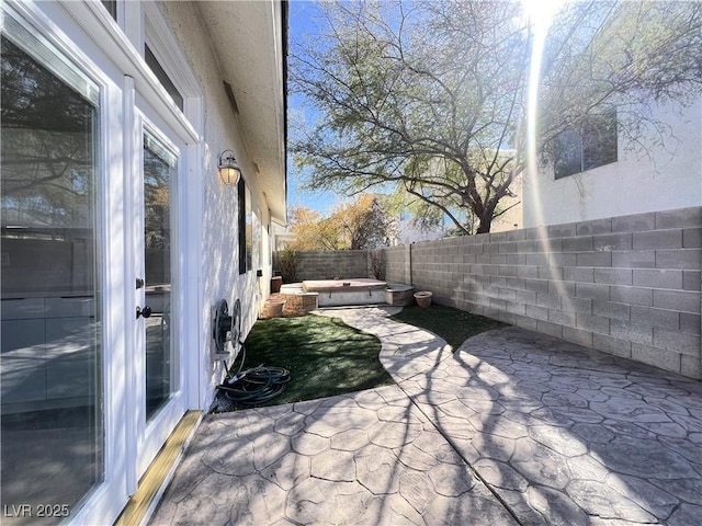 view of patio featuring a fenced backyard