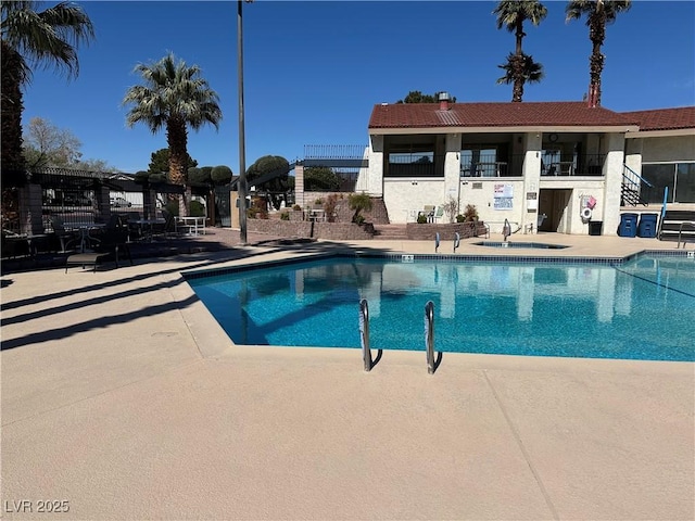 community pool featuring a patio