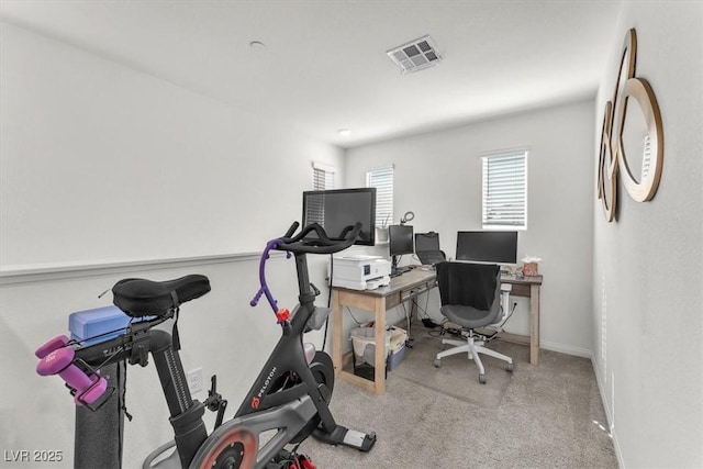 office with carpet, visible vents, and baseboards