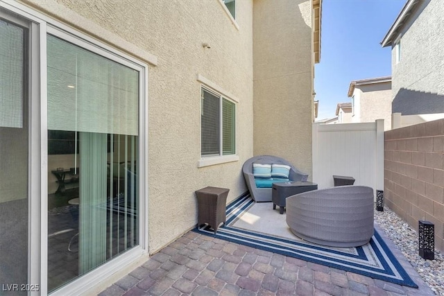 view of patio / terrace with fence