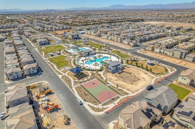 drone / aerial view with a mountain view and a residential view