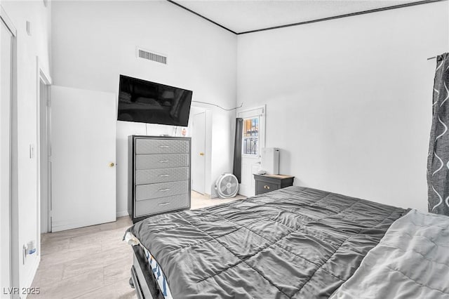4153 Broadriver Dr, Las Vegas, NV 89108 - bedroom with visible vents and a towering ceiling