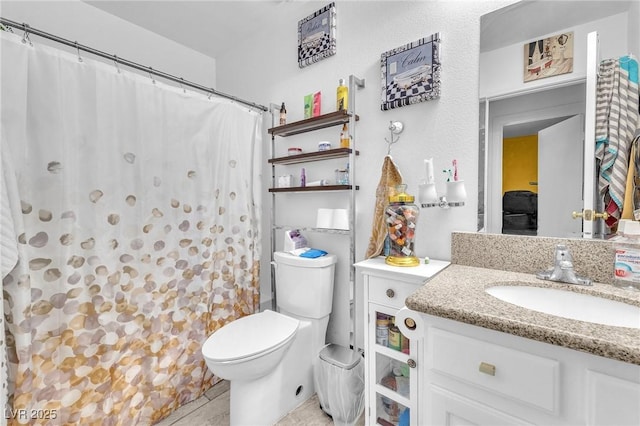 4153 Broadriver Dr, Las Vegas, NV 89108 - bathroom featuring tile patterned flooring, toilet, vanity, and curtained shower