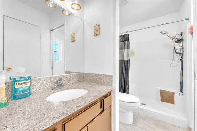 4153 Broadriver Dr, Las Vegas, NV 89108 - bathroom with toilet, vanity, and a stall shower