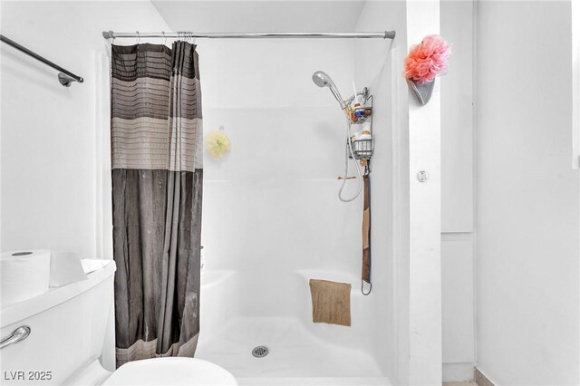 4153 Broadriver Dr, Las Vegas, NV 89108 - full bathroom featuring toilet and a stall shower
