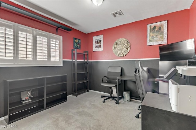 carpeted home office featuring visible vents