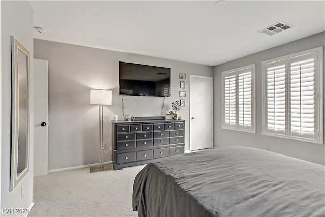 bedroom with visible vents and carpet floors