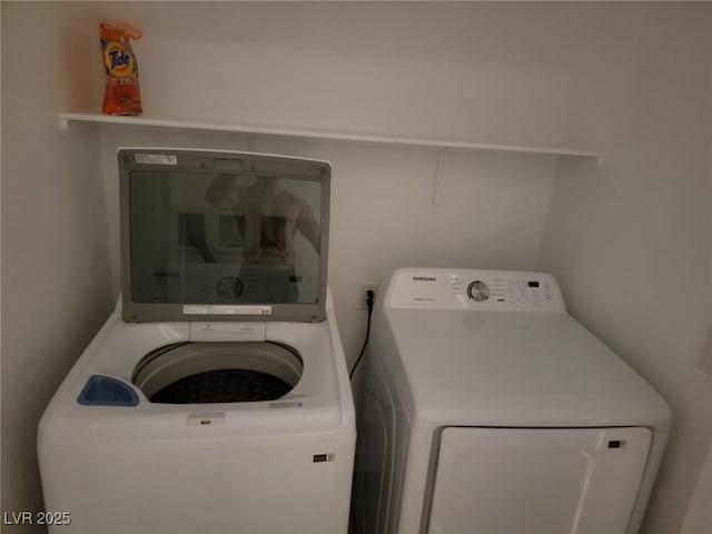 laundry area with washer and dryer