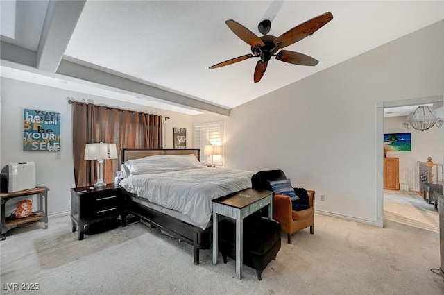 bedroom featuring light carpet, beam ceiling, a ceiling fan, and baseboards