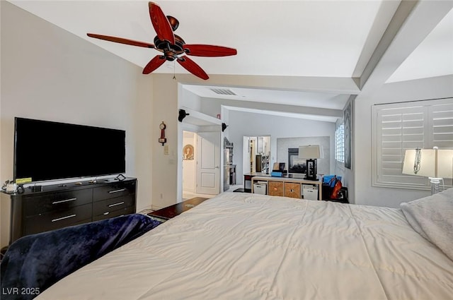 bedroom featuring visible vents, ceiling fan, and vaulted ceiling with beams