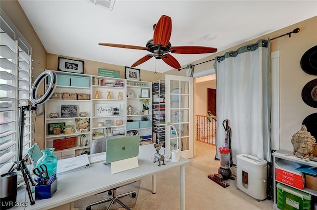 office with visible vents and a ceiling fan