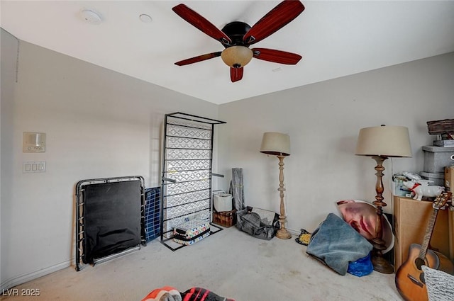 bedroom featuring baseboards and ceiling fan