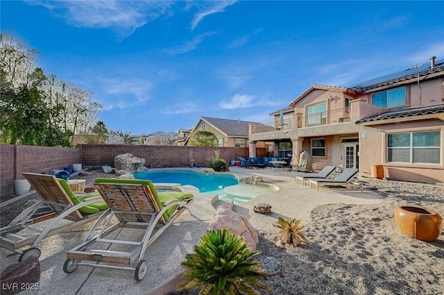 view of swimming pool featuring a patio area, a fenced in pool, and a fenced backyard