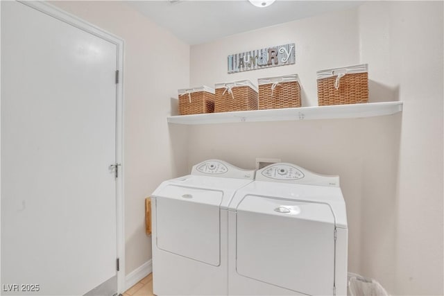 washroom with laundry area and washing machine and clothes dryer