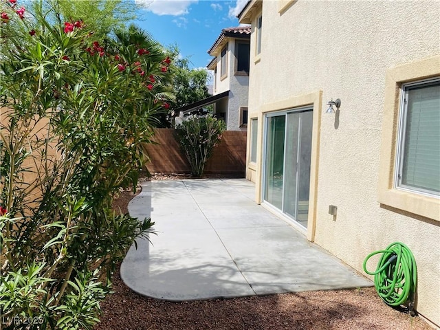 view of patio / terrace with fence