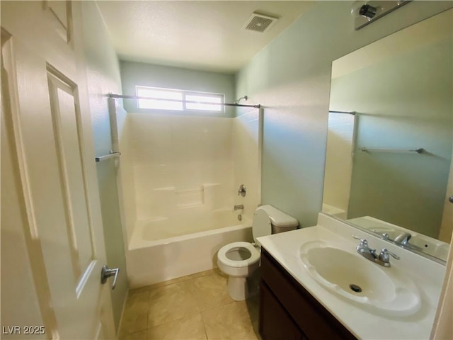 bathroom featuring vanity, visible vents,  shower combination, tile patterned floors, and toilet